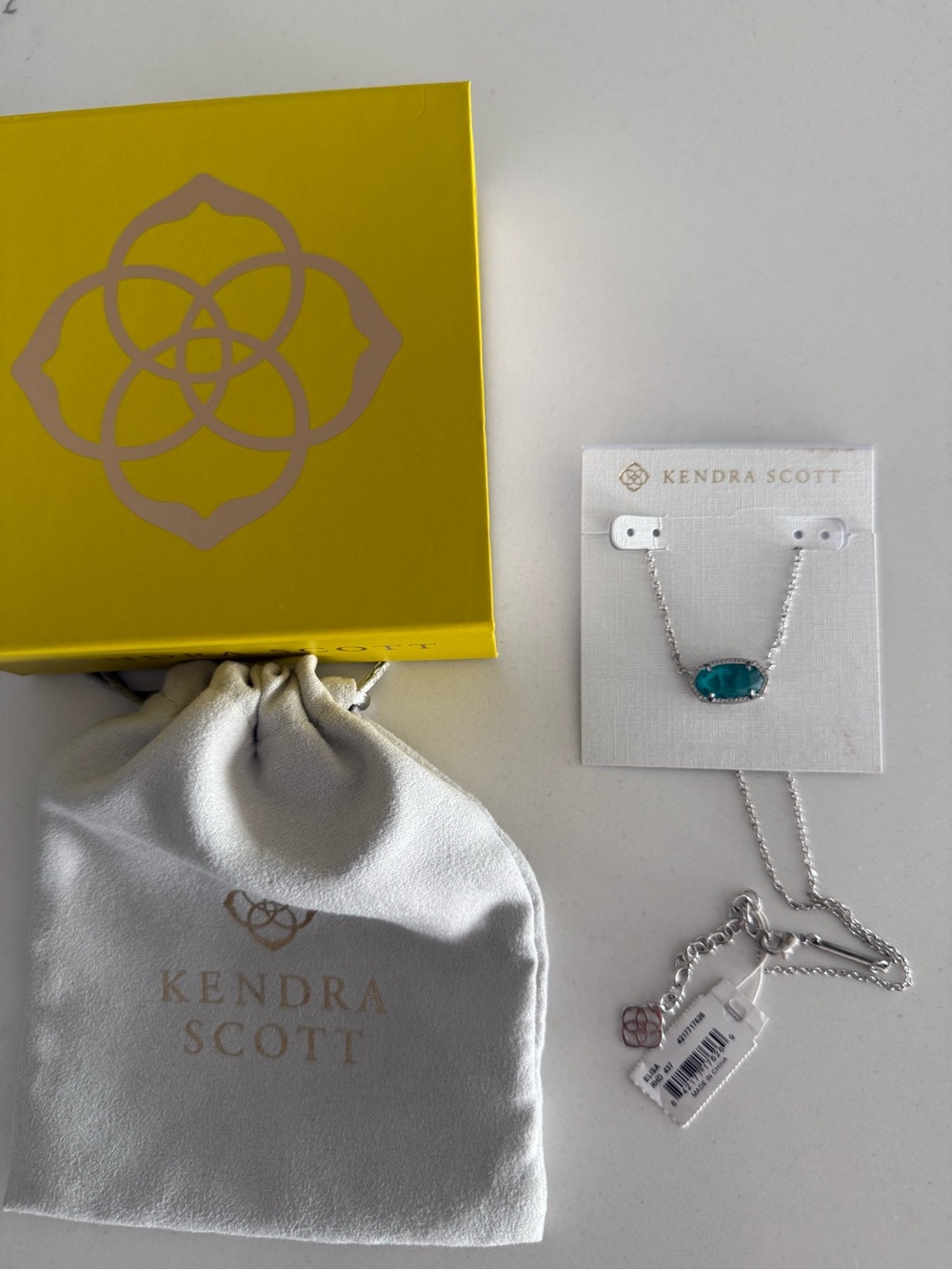 Kendra Scott Elisa Necklace with Teal Oval Stone.  Comes with dust bag and box.